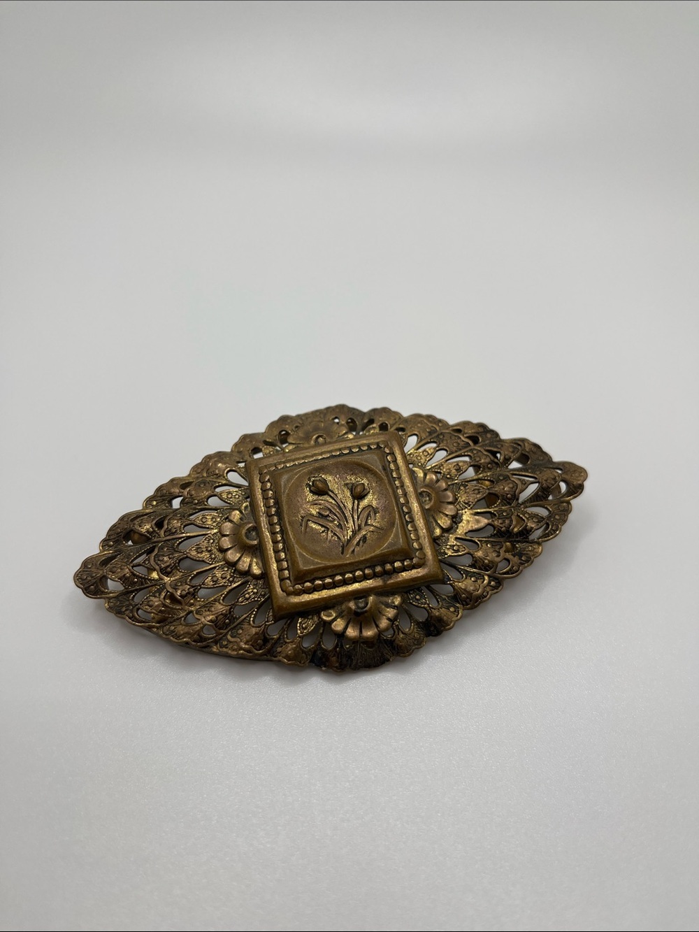 Antique Floral Filigree Brooch in Brass Tone